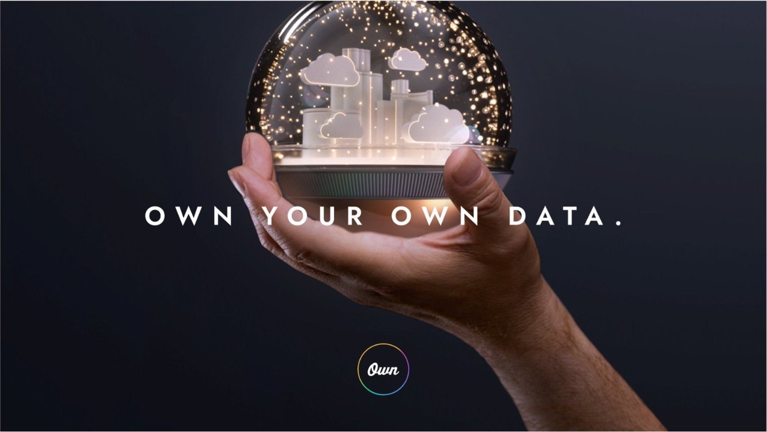 Hand holding the glowing orb with the line Own your own data